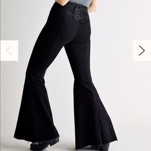 Free People lace up flare jeans.